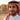 A close-up portrait from Five Season of a young Saudi man with clear, healthy eyes wearing contact lenses. He is standing outdoors in a warm, dusty desert environment with natural sunlight, highlighting eye comfort and premium lenses for dry climates